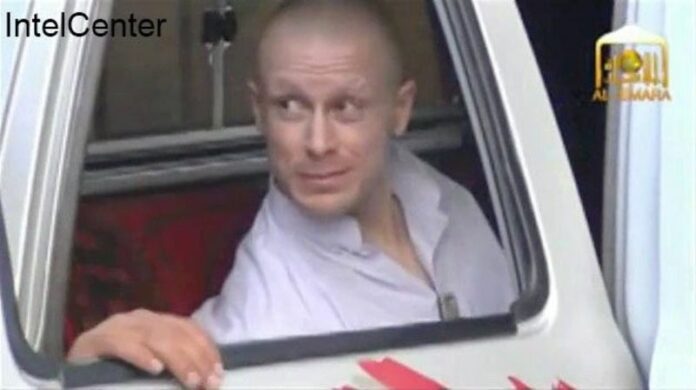A handout image made available by IntelCenter on June 4, 2014 showing captured US Army soldier Bowe Bergdahl during his release by Taliban fighters at an undisclosed location in Afghanistan on May 31, 2014. The image was taken from a video taken by the Afghan Taliban showing Bergdahl being handed over to US officials. EPA/INTELCENTER / HANDOUT MANDATORY CREDIT. HANDOUT EDITORIAL USE ONLY/NO SALES