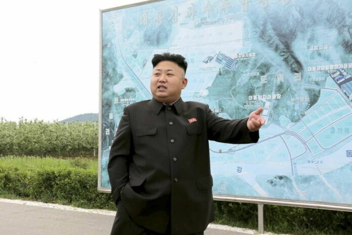 An undated handout picture released by the Rodong Sinmun, the newspaper of North Korea's ruling Workers Party, on 05 June 2014 shows North Korean leader Kim Jong-un visiting the Taedonggang Combined Fruit Farm and Taedonggang Combined Fruit Processing Factory in Pyongyang, North Korea. EPA/RODONG SINMUN
