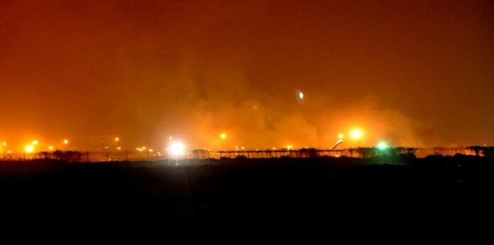 Smoke billows from Jinnah International Airport after suspected militants attacked the airport overnight Sunday in Karachi, Pakistan. At least two explosions and sporadic gunshots were heard, and an airport emergency was declared with all flights suspended. EPA/SHAHZAIB AKBER