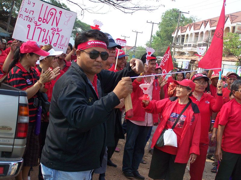 Redshirts mock the army with an imitation of the GT200 device in an anti-government protest in 2010.
