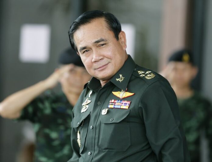 Thai army chief and junta head General Prayuth Chan-ocha shown leaving the Army Club in Bangkok, Thailand, 13 June 2014. Prayuth said Friday that Thailand should have an interim government in place by early September. EPA/NARONG SANGNAK<br />