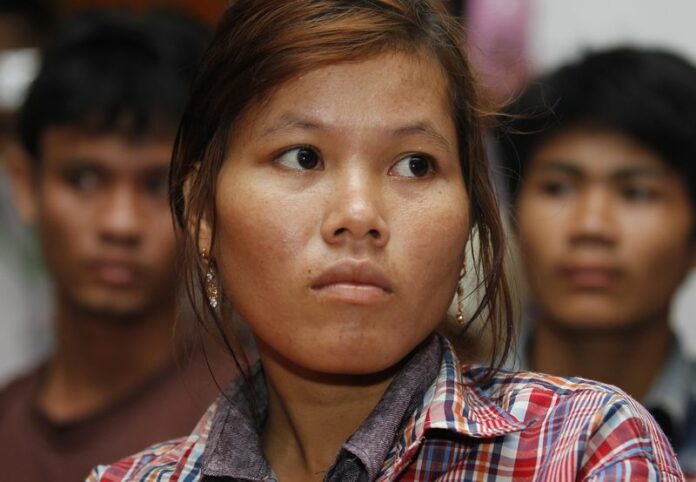 Returned from Thailand illegal Cambodian migrant workers attend a press conference in Phnom Penh, Cambodia, 13 June 2014. Cambodian opposition leader Sam Rainsy holds the press conference as Thai authorities returned thousands of Cambodians who illegally worked in Thailand to Cambodia after the military coup in Bangkok. (DPA)