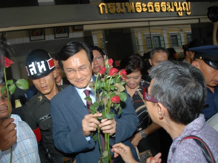 Chaturon Chaisang, former Education minister, heard a third charge of violating the Computer Crimes Act in martial court, 20 June 2014.