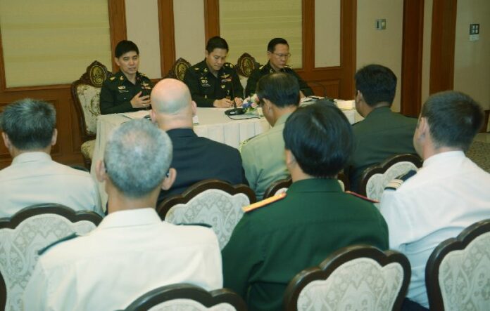 A spokesperson for the National Council of Peace and Order speaking to foreign military attaches on 25 June, 2014.