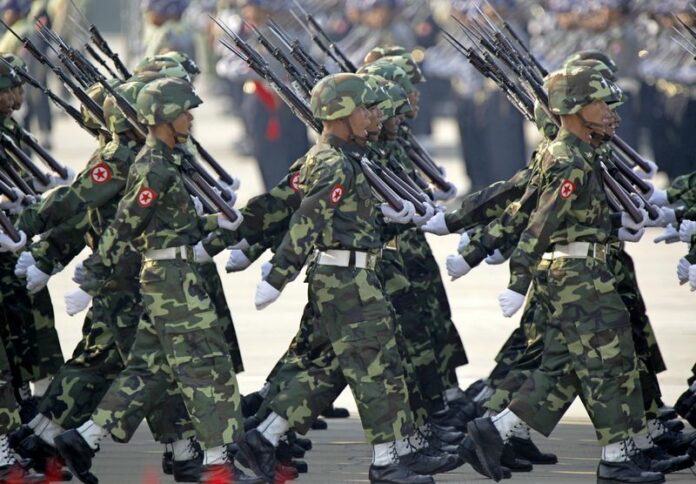 Myanmar military soldiers march in 2014 during the 69th Armed Forces Day in Naypyitaw, Myanmar.Photo: EPA/LYNN BO BO