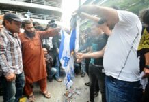 Demonstrators Burn Israeli Flags At Embassy Protest in Bangkok