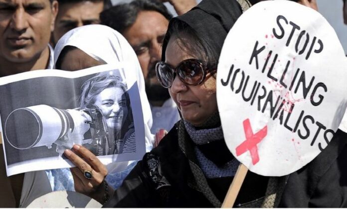 A file photograph showing Pakistani journalists rallying to condemn the killing of German photojournalist Anja Niedringhaus, in Islamabad, Pakistan, 07 April 2014. An Afghan court has sentenced to death the police officer responsible for the murder. EPA