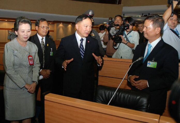 NCPO member Adul Saengsingkaew (centre) visits the House of Parliament, which will be used by the National Legislative Assembly, 30 July 2014.