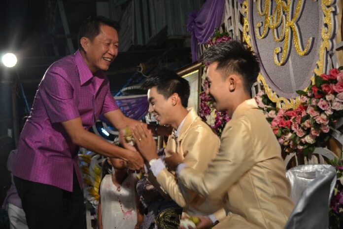 Gay couple Maitri Chotipinit and Chirasak Klangboriboon at their wedding in Udon Thani province, 2 August 2014