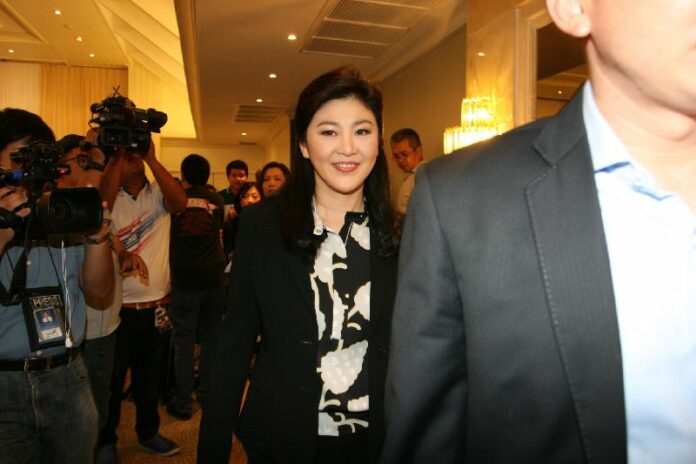 Former Prime Minister Yingluck Shinawatra at the press conference in Bangkok on 18 July 2014.