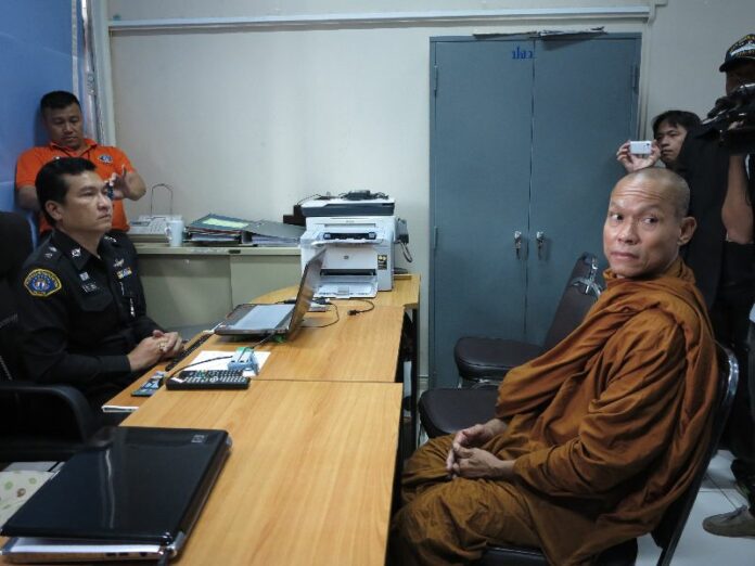 Buddhist monk and former anti-government activist Buddha Issara filed criminal charges against two men responsible for a video calling on the King of Thailand to abdicate his throne, 7 August 2014.