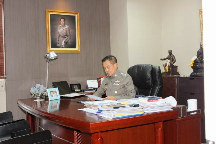 Pol.Gen. Somyot Phumphanmuang in his new office after being appointed chief of the Royal Thai Police on 20 August 2014.