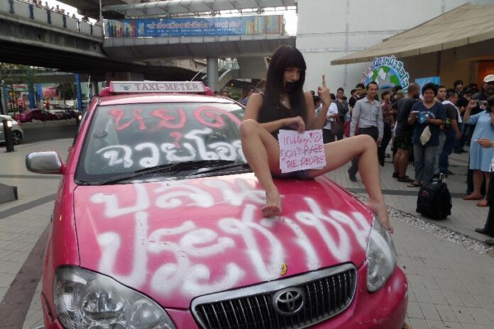 Aum Neko protesting the military's declaration of martial law in Bangkok, 20 May 2014.