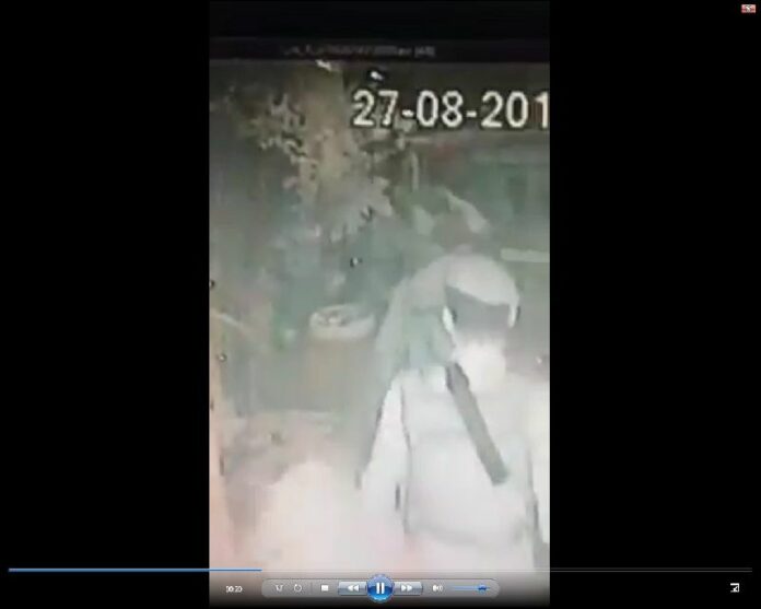 CCTV footage from the crime scene shows more than a dozen soldiers armed with M16 rifle barge into the nightclub and brutally beat the security guards, 28 August 2014.<br />