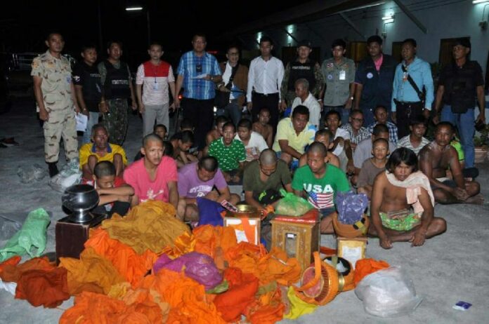 Twenty-eight Thai men have been arrested for posing as monks and temple assistants to collect donation money that they allegedly used for gambling, pornography, and narcotics, 4 Sept 2014.