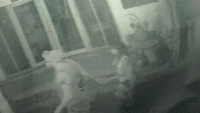 The handout that police originally said showed Witheridge and Miller leaving a bar on Koh Tao. They later retracted the statement and said they misidentified the pair.