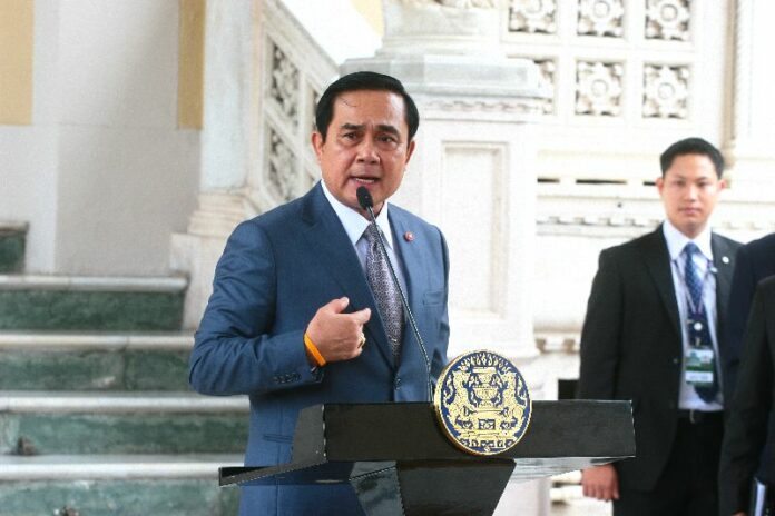 Gen. Prayuth speaking to reporters at the Government House in Bangkok, 24 Sept 2014.<br />
