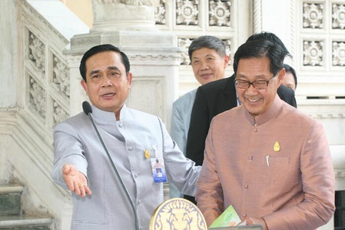 Prime Minister Gen. Prayuth Chan-ocha, left, and Deputy Prime Minister Pridiyathorn Devakula in 2014.