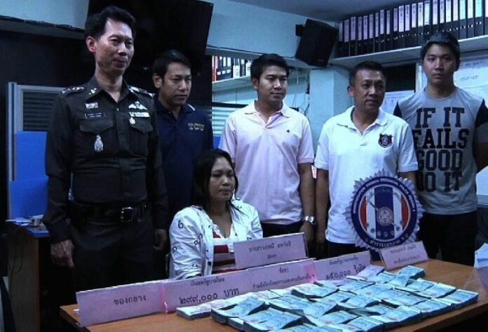 Kessanee Mahayothee, 34, was arrested near the Thai - Malaysian border in Songkhla province as she was attempting to leave the country with more than 1.8 million baht in cash, police say. 18 Oct 2014.<br />