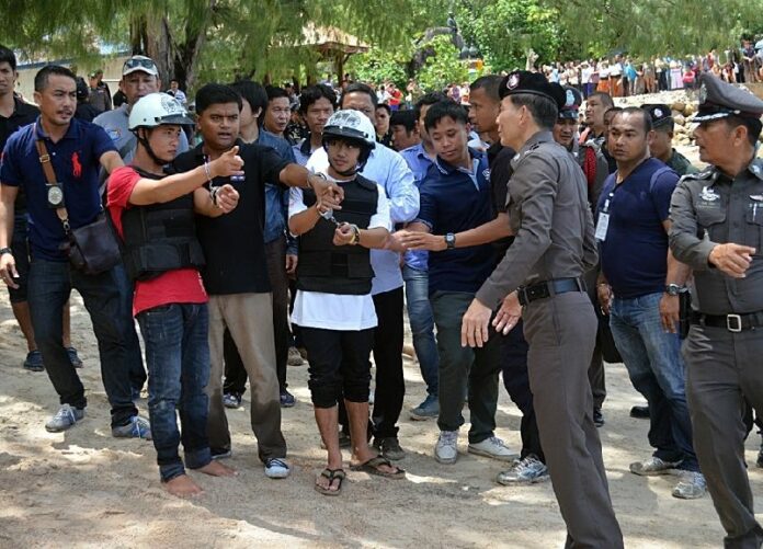 The 2 suspects were forced to "re-enact" their crime for police on 3 Oct 2014.