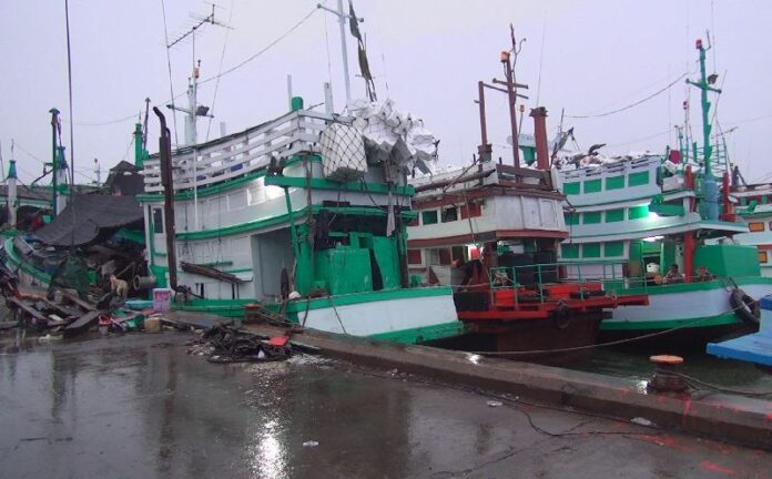 Fishing vessels stranded at a dock in Songkhla province. <br />