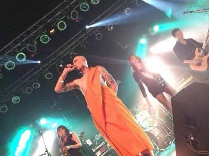 Photos of the lead singer of Japanese punk-rock band wearing a monk's robe on stage sparked a controversy among Thai Buddhists, Nov 2014.