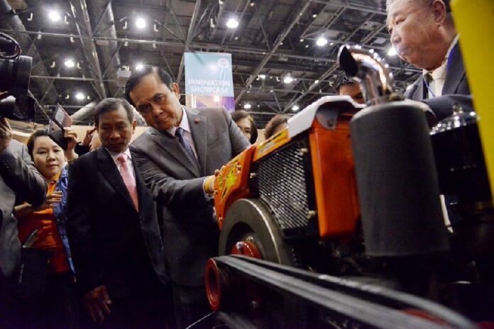 Prime Minister Gen. Prayuth Chan-ocha visits an exhibition that promotes innovation in Thai economy in Bangkok, Sept. 18, 2014.