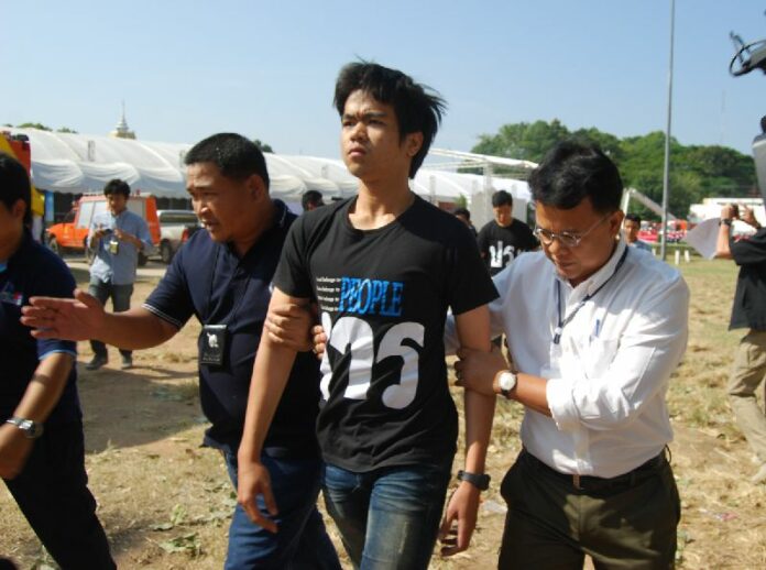 Police arrest one of the five students who flashed "three finger salute" at Gen. Prayuth in Khon Kaen province on 19 November 2014