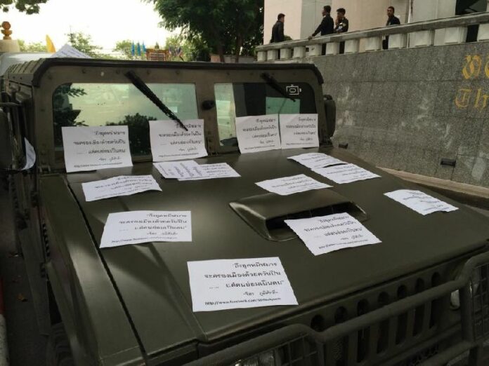 Leaflets placed on a military jeep at Thammasat University by student activists, 24 November 2014 (photo by LLTD Facebook page)