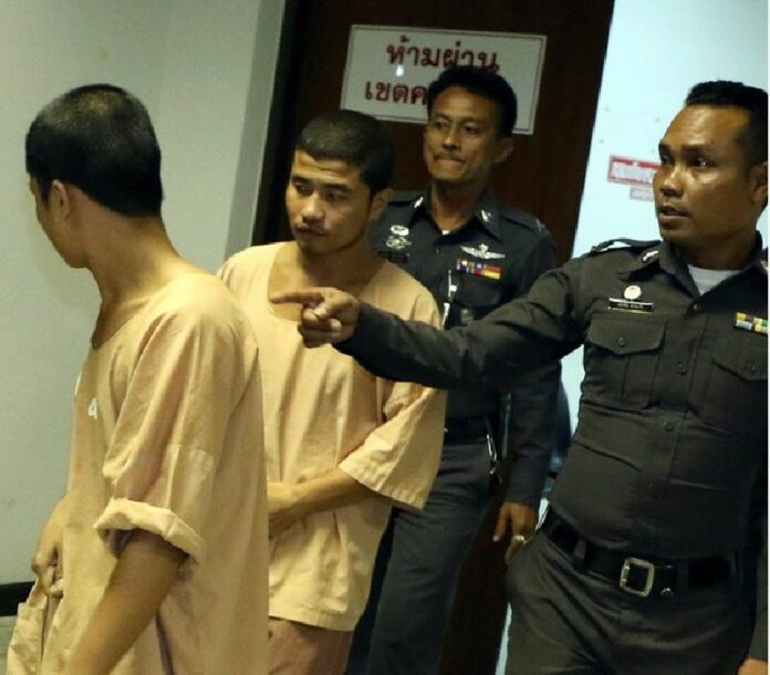 A photo made available on 15 October 2014 shows two Myanmar migrant workers Win (L) and Saw (second left), suspects in the killing of two British tourists, at Koh Samui Provincial Court in Surat Thani province, southern Thailand, 14 October 2014. A Thai court indicted the Myanmar suspects for the murder of two British tourists. EPA/SITTHIPONG CHAREONJAI BEST QUALITY AVAILABLE<br />