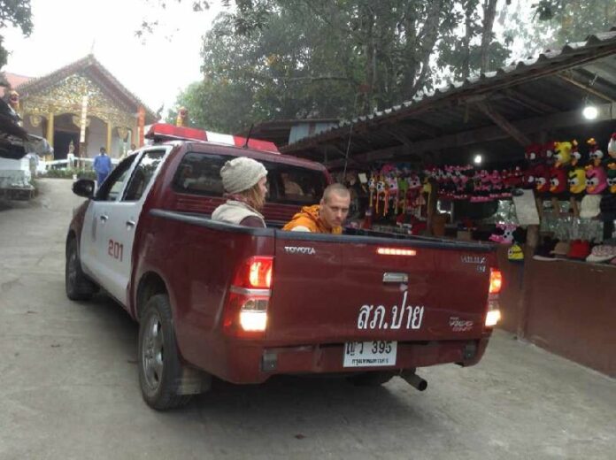 Police arrest two Russian men for allegedly breaking into a temple in a northern resort town and dressing as Buddhist monks, 14 Dec 2014.<br />