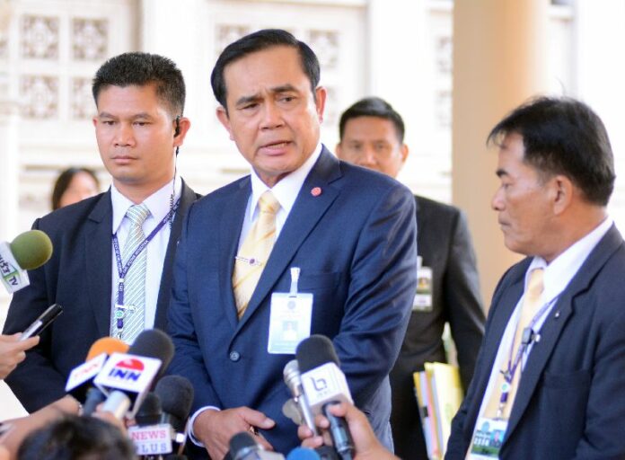Thailand’s military junta leader and Prime Minister Prayuth Chan-ocha speaking to reporters at the Government House, 15 Dec 2014.