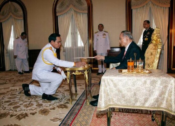 Gen. Prayuth receives a royally-endorsed interim constitution from HM the King on 22 July 2014.
