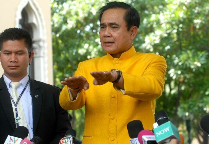 Prime Minister and junta chairman Gen. Prayuth Chan-ocha speaking to reporters at the Government House in Bangkok, 16 Dec 2014.<br />