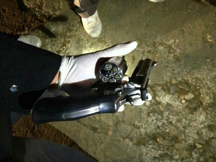 The gun found on Pol.Lt. Boonyarit's lap, 19 Dec 2014.