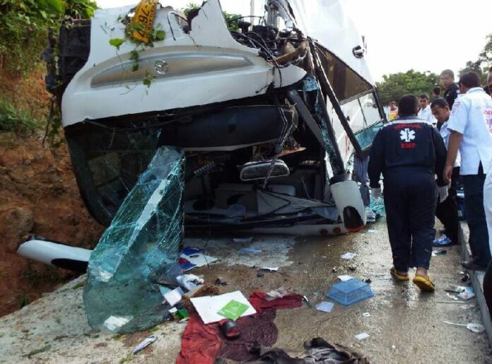 Scene of the bus crash in Phuket province that injures 37 Russian tourists, 30 December 2014.