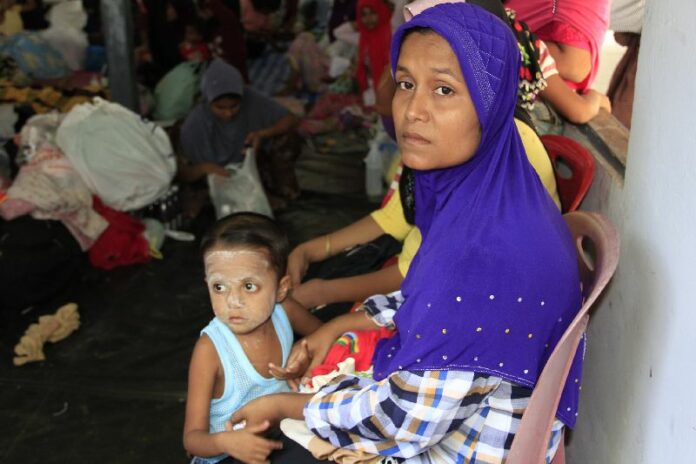 The refugees are being held at a shelter in Hua Sai district, Nakhon Sri Thammarat province. 14 Jan 2015.