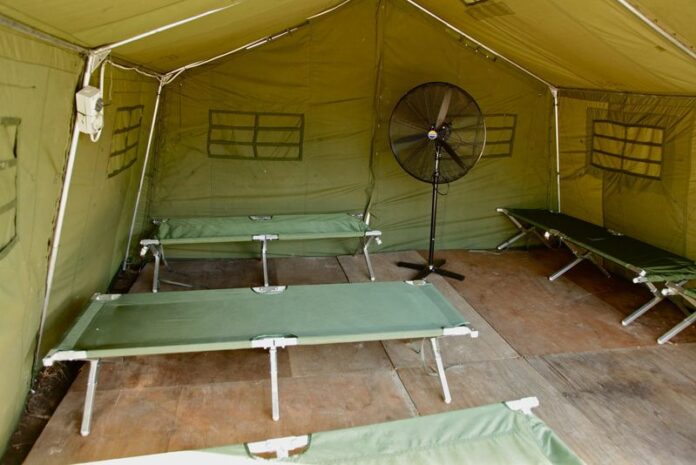 Tent accomodation for asylum seekers at Manus Island, Papua New Guinea, on 21 November 2012. Three hundred asylum seekers are on hunger strike over conditions in a detention centre on Manus Island, refugee advocates said Wednesday. EPA/DEPARTMENT OF IMMIGRATION AND CITIZENSHIP AUSTRALIA AND NEW ZEALAND OUT HANDOUT