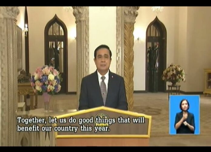 Gen. Prayuth speaking during his weekly televised address, a program broadcast on state channels called "Returning Happiness to the People."
