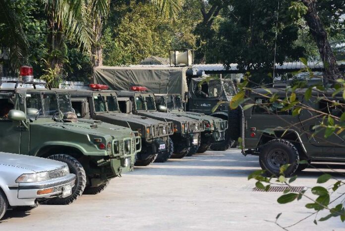 Military vehicles surround the Parliament House in Bangkok to prevent Yingluck's supporters from protesting her impeachment trial, 22 Jan 2015.
