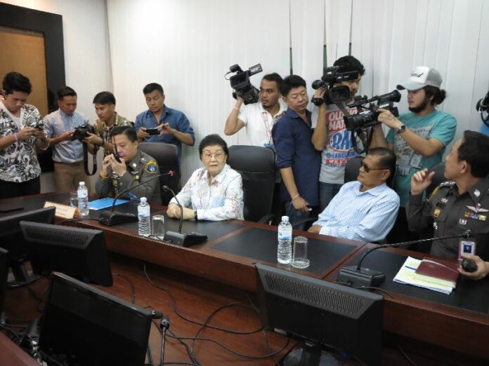 Apiruj and Wantanee Suwadee at the Crime Suppression Division headquarters in Bangkok, 9 Feb 2015.<br />