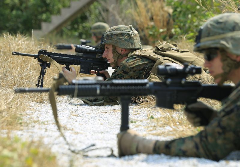 U.S. marines take part in an amphibious assault joint military exercise as part of Cobra Gold 2014 at a military base in Chonburi province on Feb. 14, 2014. Photo: Narong Sangnak / EPA