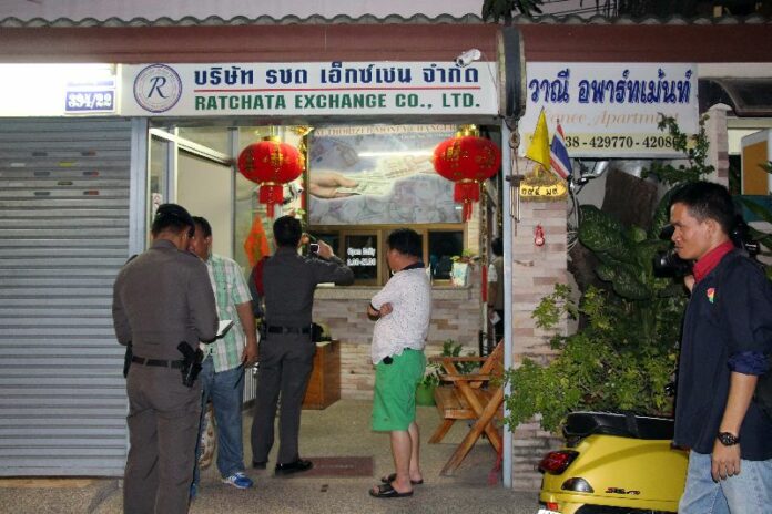 Cops investigate the crime scene on 8 Feb 2015.