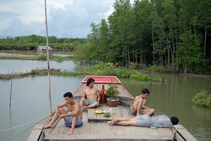 An undated handout picture provided by the Berlin Film Festival on 12 February 2015 shows Vietnamese actors Truong The Vin, Truong Van Hoang, Mai Quoc Viet and Le Cong Hoans in a still from the film 'Big Father, Small Father and Other Stories' (Cha va con va) by Vietnamese director Phan Dang Di. The movie will be presented in out of competition of the 65th annual Berlin Film Festival 'Berlinale', which runs from 05 to 15 February. EPA