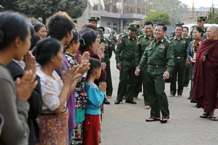 Myanmar military commander-in-chief Senior General Min Aung Hlaing meets war victims who fled from the conflict zone in Lashio, northern Shan State, Myanmar, 15 February 2015. Myanmar troops killed at least 26 rebels near the Chinese border in accelerated fighting following recent heavy government casualties, state media reported Monday. EPA