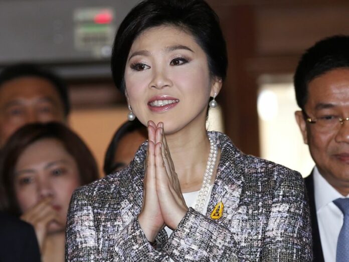 A file photo of former Thai prime minister Yingluck Shinawatra arriving at the National Legislative Assembly (NLA) during impeachment proceedings against her, at Parliament House in Bangkok, Thailand, 22 January 2015. Shinawatra was to be indicted on criminal charges stemming from her government's rice subsidy scheme. EPA/NARONG SANGNAK <br />