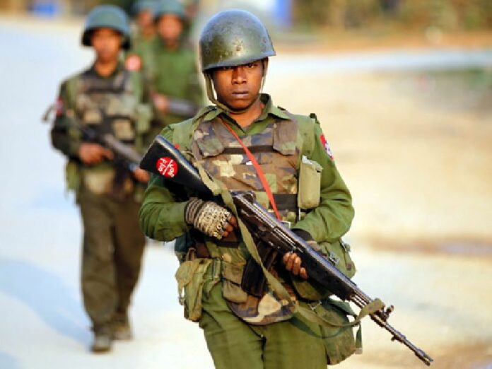 Myanmar military troops march in northern Shan State, Myanmar, 16 February 2015. Four people including a journalist and local aid worker were injured as rebels attacked a Red Cross vehicle carrying wounded in north-eastern Myanmar, state media reports Sunday. EPA/LYNN BO BO