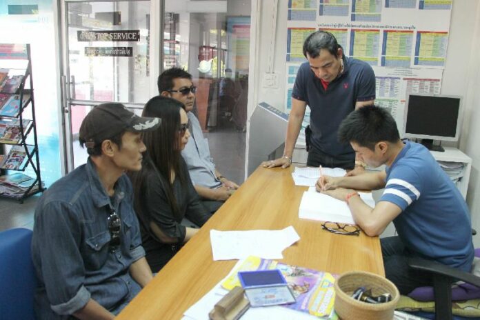 Activists from "Free People of Thailand 58" at Phayathai police station, where they were brought for attitude adjustment on 22 Feb 2015.<br />