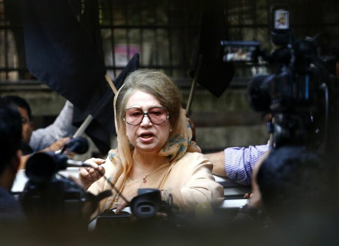 A file photo shows Bangladesh Nationalist Party (BNP) leader and former Prime Minister Khaleda Zia speaking to journalists from inside her office after police put barricades around her private offices in Dhaka, Bangladesh, 05 January 2015. EPA/ABIR ABDULLAH