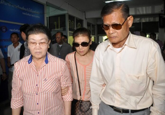 Apiruj, Panita, and Wantanee Suwadee at the Crime Suppression Division in Bangkok, 27 Feb 2015.<br />